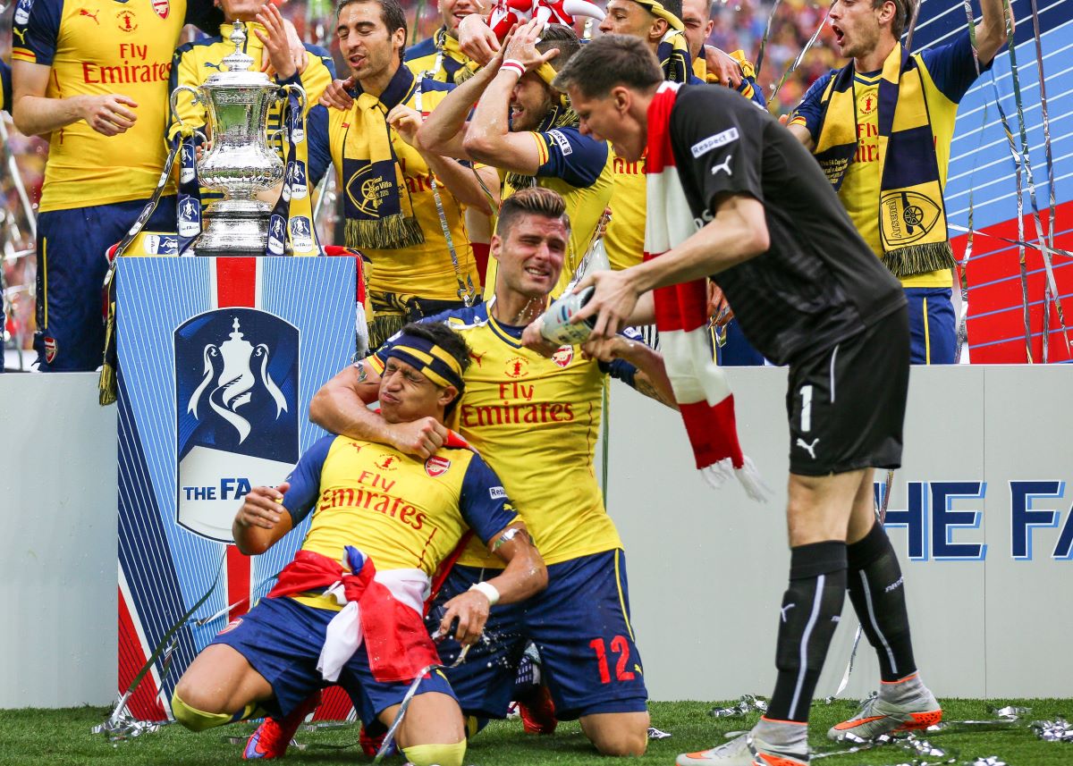 Wojciech Szczesny con Alexis Sánchez en Arsenal
